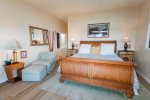 The bedroom features a king bed with unrivaled ocean views